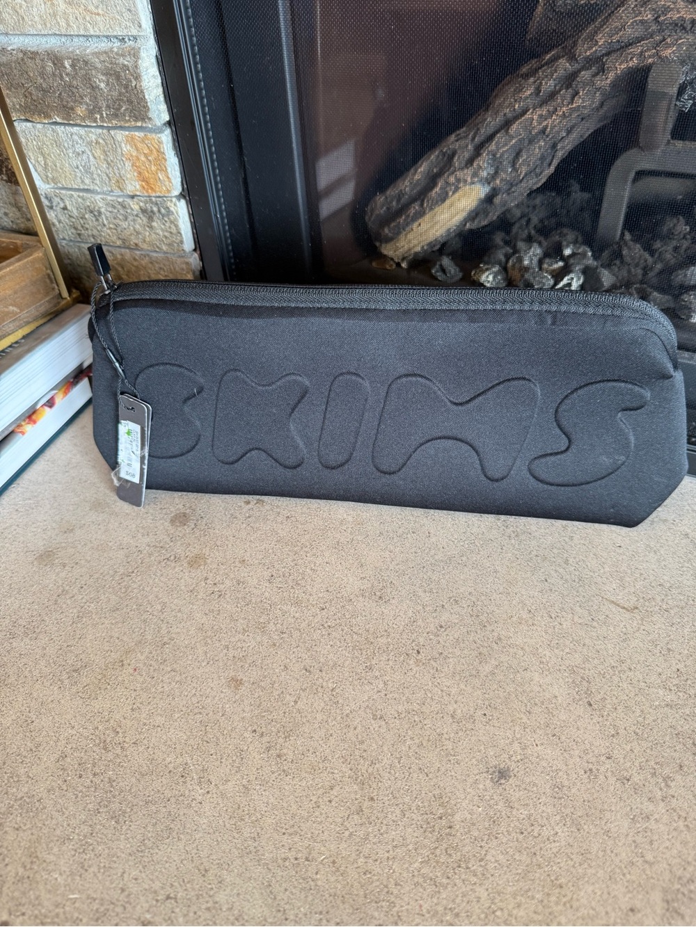 SKIMS Black Embossed Logo Toiletry Pouch